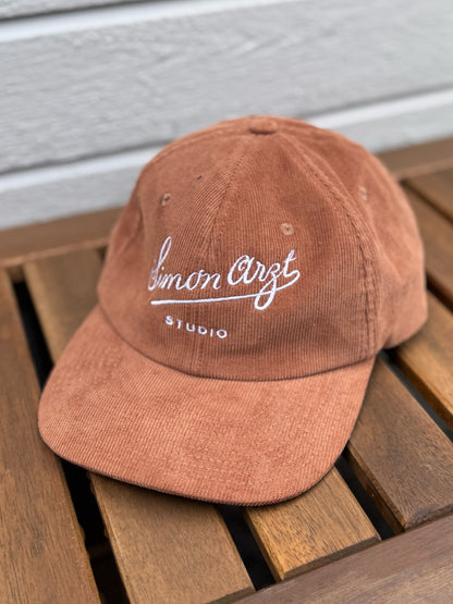 Simon Arzt Logo White